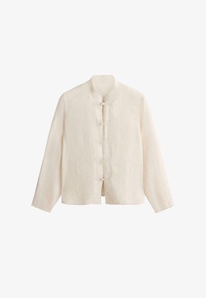Veste beige en lin à manches longues avec col mandarin et cinq fermetures à boutons noués traditionnels sur le devant.