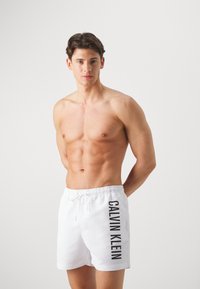 Calvin Klein Swimwear MEDIUM DRAWSTRING - Kopalne hlače - classic white
