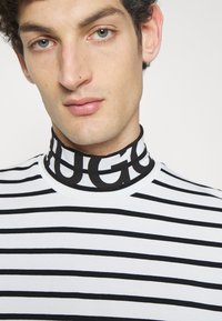 HUGO DARDINI - Camisola de manga comprida - open white