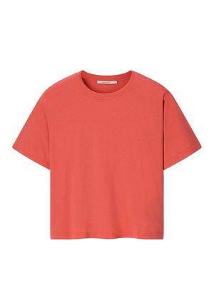 T-shirt court corail manches courtes avec encolure ronde et couture simple.