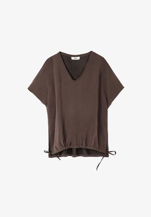 Brown linen blouse with a V-neck, short sleeves, and elastic waist. Features drawstring ties at the sides and a relaxed fit.