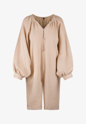 Beige Baumwoll-Overall mit strukturiertem Oberflächen, übergroßen langen Ärmeln, Knopfverschluss und verkürztem Bein.