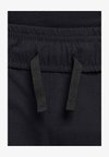 TECH PANT UNISEX - Treniņtērpa apakšdaļas - black black