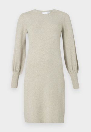 Beige gebreide trui jurk met lange mouwen, geribde manchetten en een ronde halslijn.