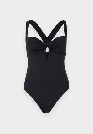 Μαύρο ολόσωμο μαγιό με φαρδιές σταυρωτές τιράντες στους ώμους και κεντρικό μπροστινό κοψίματα με λεπτομέρειες από ραμμένο ύφασμα.