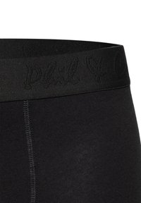 Boxer ajustado de algodón negro con una textura suave, que presenta una cinturilla elástica ancha con el nombre de la marca estampado. Detalle de costura reforzada.