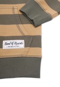 Striped sweater in tan and olive green, featuring ribbed cuffs and hem, with a white brand tag displaying "Band of Rascals."