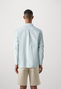 Lacoste Marškiniai - fluorine green/white