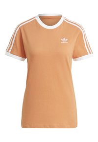 Peach-colored cotton t-shirt with white crew neck and cuffs. Features three white stripes on shoulders and small white logo on chest.