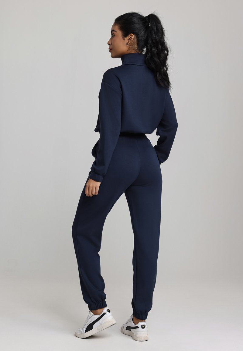 REORIA Joggingpak voor dames, V-hals, tweedelig trainingspak, huispak, sportset, elegante outfit, loungeset, Donkerblauw, M REORIA Joggingpak voor dames, V-hals, tweedelig trainingspak, huispak, sportset, elegante outfit, loungeset, Donkerblauw, M