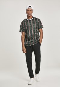 Southpole STRETCH JOGGER  - Treniņtērpa apakšdaļas - black