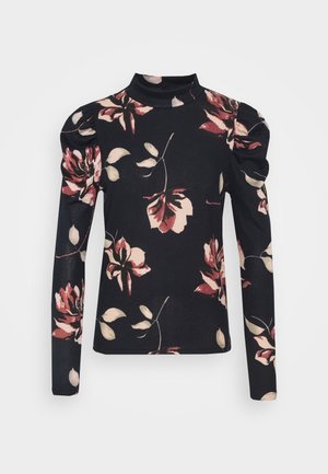 Top negro de manga larga con cuello alto, hombros abullonados y gran estampado floral en rosa y beige.