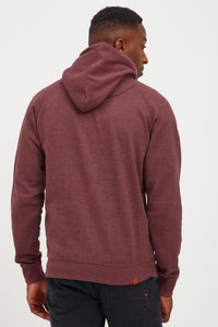 Maroon hoodie with a textured finish, featuring a hood, ribbed cuffs, and a banded hem. Back view shows a smooth, clean design.