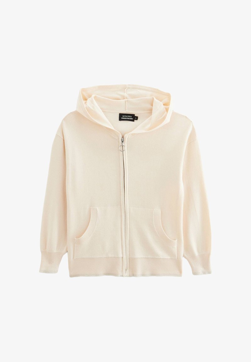 Haut de sweat à capuche zippé beige clair en tissu doux, doté d'une capuche, de deux poches frontales, de poignets côtelés et d'une texture lisse avec des détails de conception minimaux.