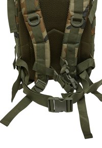 Camouflage backpack feature: mesh back, adjustable straps, and green webbing. Includes buckles and hardware for securing gear.