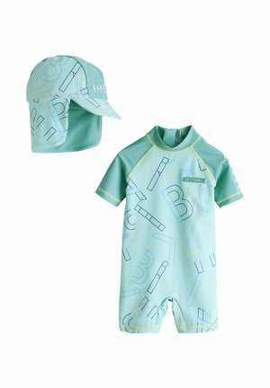 Light blue rash guard set with short sleeves, featuring geometric patterns in dark blue and yellow. Includes a matching cap with a visor.