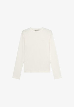 Bílá dlouhá rukávová tričko vyrobené z měkké tkaniny, s kulatým výstřihem a malým logem na hrudi. Jednoduchý, přiléhavý design.