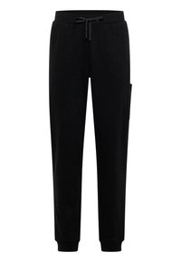 Sorte sweatpants lavet af blødt stof, med elastisk talje og snoretræk, sidelommer og ribbede manchetter ved anklerne.