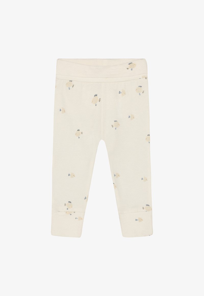 Kremfarvede leggings lavet af blødt stof med små fiskemønstre i lysebrun og blå. Elastik i taljen og med manchetter forneden.