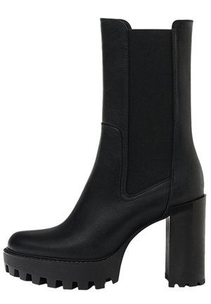 Botte noire en cuir mi-mollet avec panneau élastique sur le côté, semelle crantée épaisse et talon haut carré pour allier style et adhérence.