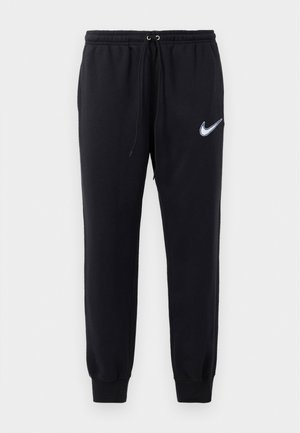 Sorte Nike sweatpants med elastisk talje og snoretræk. Har indsnævrede ben og et hvidt broderet logo på venstre lår.