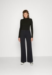 Replay PANTS - Calças - black