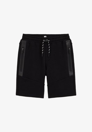 Shorts de sport noirs avec ceinture élastique, cordon de serrage blanc et noir, et poches latérales zippées avec bordure brillante.
