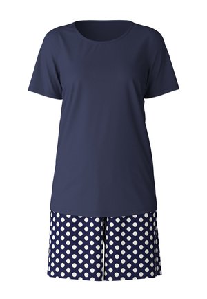 Camicetta blu navy a maniche corte con scollatura rotonda abbinata a pantaloni corti blu navy con pois bianchi e una vestibilità rilassata.