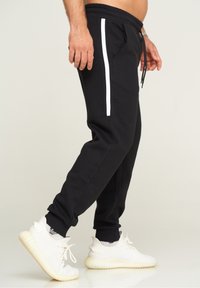 Jack & Jones KANE JJHARRY - Jogginghose - black