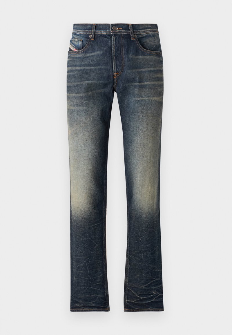 Denim jeans in a dark blue wash, featuring fading towards the bottom, five pockets, yellow stitching, and a button closure.