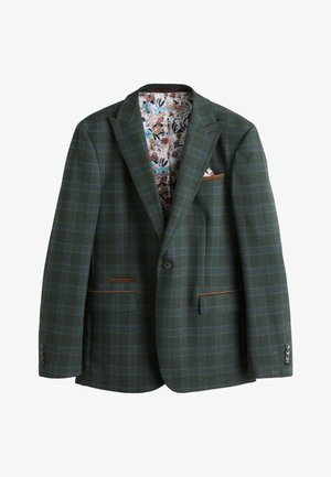 Blazer a quadri verde con linee blu, rifiniture marroni sulle tasche, fodera interna a motivo floreale e fazzoletto da taschino bianco con fantasia.