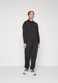 Puma LOUNGEWEAR TRACKSUIT SET - Tracksuit - black