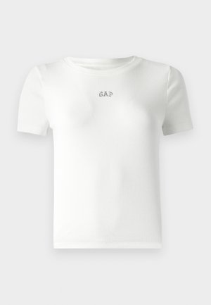 Witte ribbed t-shirt met korte mouwen en een ronde halslijn, voorzien van een klein geborduurd "GAP" logo in het midden. Zachte stoffen textuur.