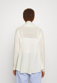 Repeat Neuletakki - off-white