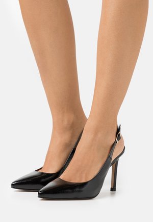 Tacones - charol dumas