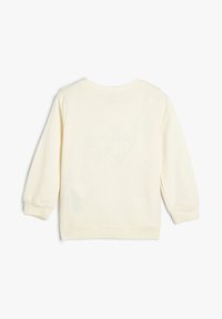 Lichtcrème katoenen sweatshirt, ronde hals, lange mouwen met ribgebreide boorden en een subtiele tekstontwerp op de achterkant. Soepele textuur.