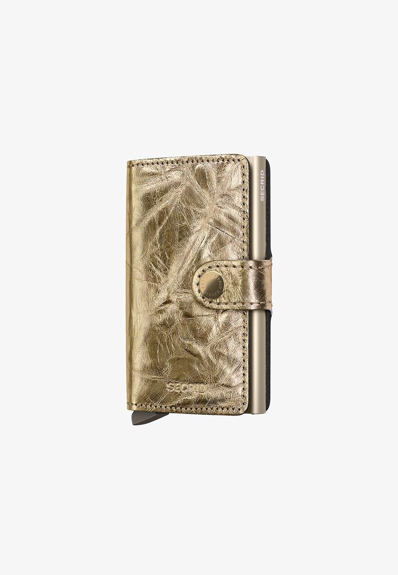 Gold metallic wallet with a textured finish, snap closure, and SECRID branding. Features cardholder slot and secure aluminum compartment.