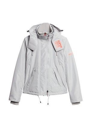 Light gray winter jacket with high collar, zipper front, drawstrings, side pockets, and orange "Superdry" logo on shoulder and flap.