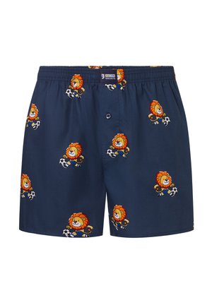 Marineblauwe boxershorts met oranje cartoonleeuwen die voetbal spelen, overal bedrukt en een elastische tailleband met een knoop aan de voorkant.
