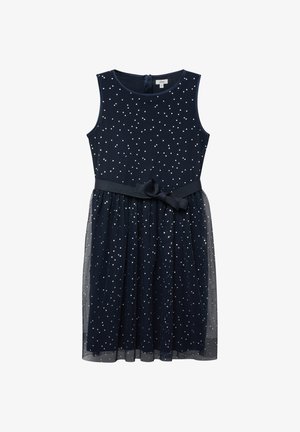 Ärmelloses, marineblaues Kleid mit weißen Punkten, einem transparenten Tüllrock-Überwurf und einem passenden Stoffgürtel, der in der Taille zu einer Schleife gebunden ist.