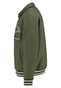 Olive green jacket with a structured collar, side pockets, ribbed cuffs, and waistband. Features embroidered logo detail on the chest.