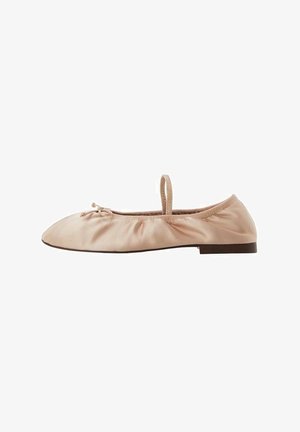 Beige ballet flat with a soft satin finish, rounded toe, elastic strap, and gathered texture along the sides. Low brown heel.