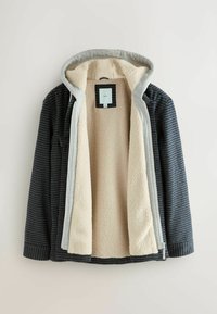 Karierte dunkelblaue Jacke mit einer grauen Kapuze, ausgestattet mit einem cremefarbenen Fleecefutter und einem Reißverschluss. Innenetikett angebracht.
