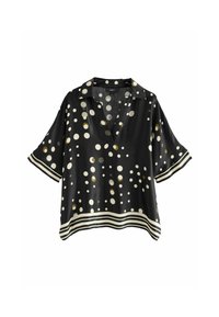 Schwarze Bluse mit kurzen Ärmeln, tiefem V-Ausschnitt, großen weißen und goldenen Punkten und einem kontrastierenden gestreiften Saum. Seidige Textur.