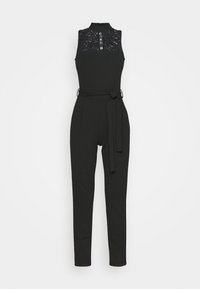 Černý overal s krajkovým živůtkem, vysokým výstřihem a zavázáním v pase. Přiléhavé nohavice sahají až k kotníkům. Hladká textura po celém povrchu.