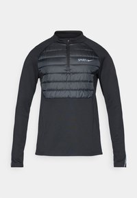 Mustad musta pikkade varrukatega pullover, millel on tõmblukuga krae; sisaldab tikitud puffer-paneeli rinnal; esiküljel helesinised "SPURS" ja Nike logod.