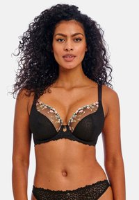 Black lace bra featuring embroidered floral details in soft pink and green on sheer cups, with a scalloped edge and small central embellishment.