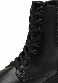 s.Oliver Bottines à plateau - black glitter