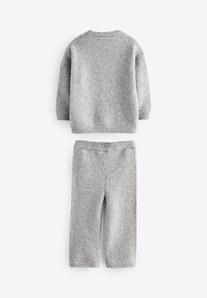 Gray knitted sweater and pants set. Sweater has a round neckline and ribbed cuffs. Soft texture, casual design, and relaxed fit.