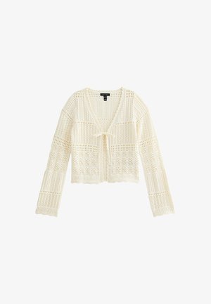 Crochet cardigan in off-white with a tie closure. Features intricate patterns and long sleeves, showcasing a textured, open-knit design.